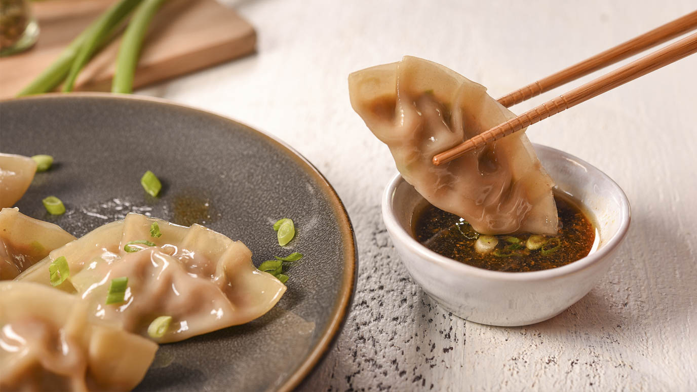 steamed_pork_dumplings_with_soy_ginger_sauce2000x1125.jpg