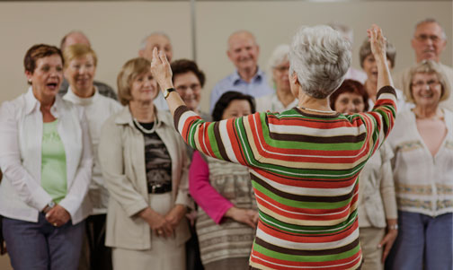 A small choir rehearsing