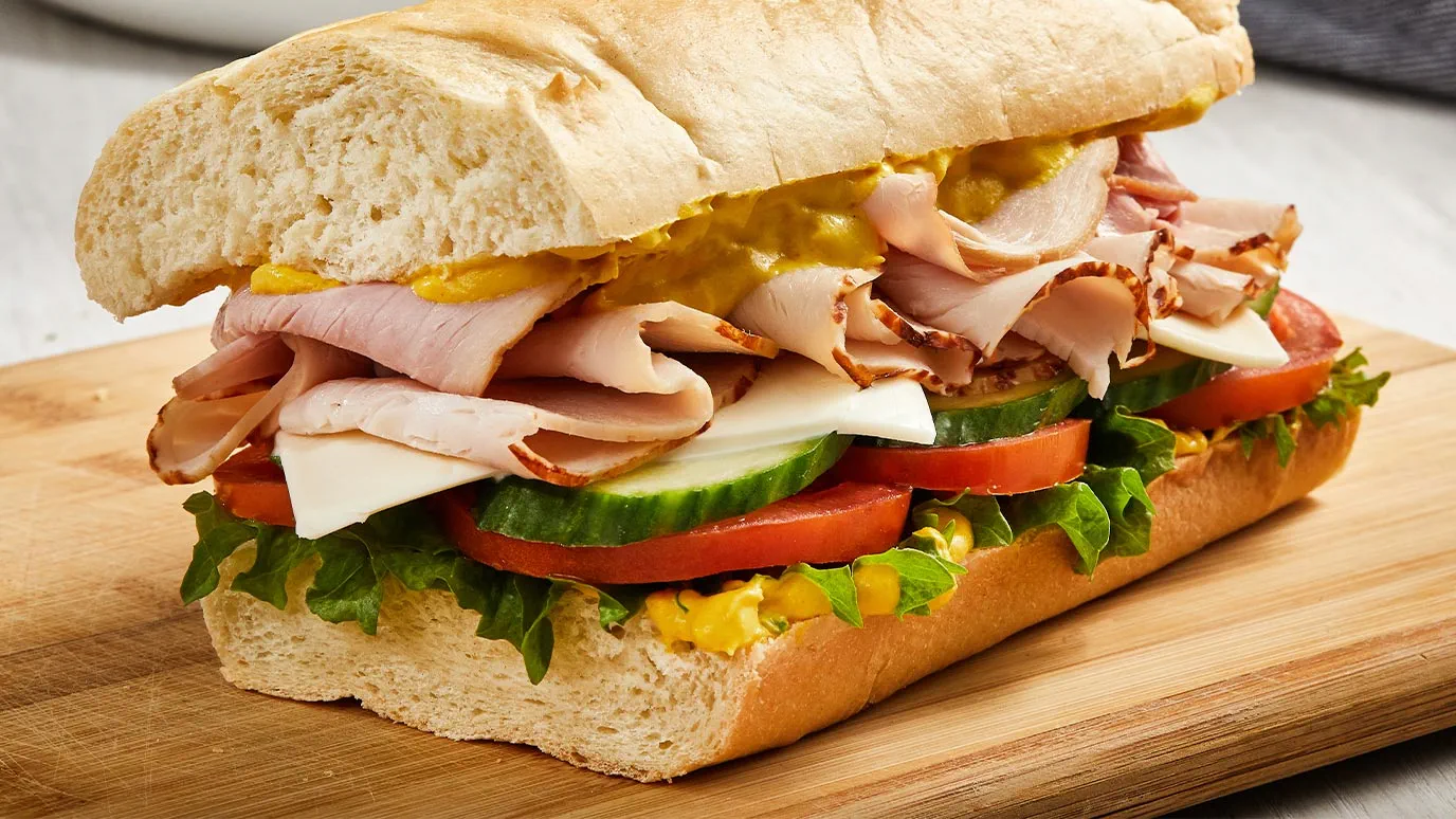 ham_and_turkey_sub_with_creamy_yellow_mustard_spread_17758_1376x774.webp