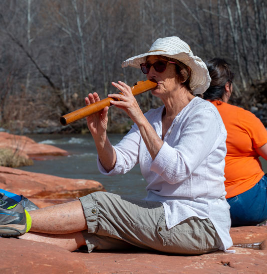 A woman playing flute