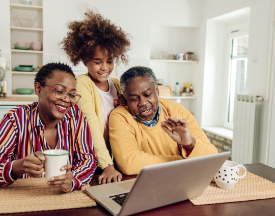 Family looking at the computer