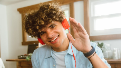 Kid waving to cameras