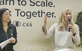 People talking on stage